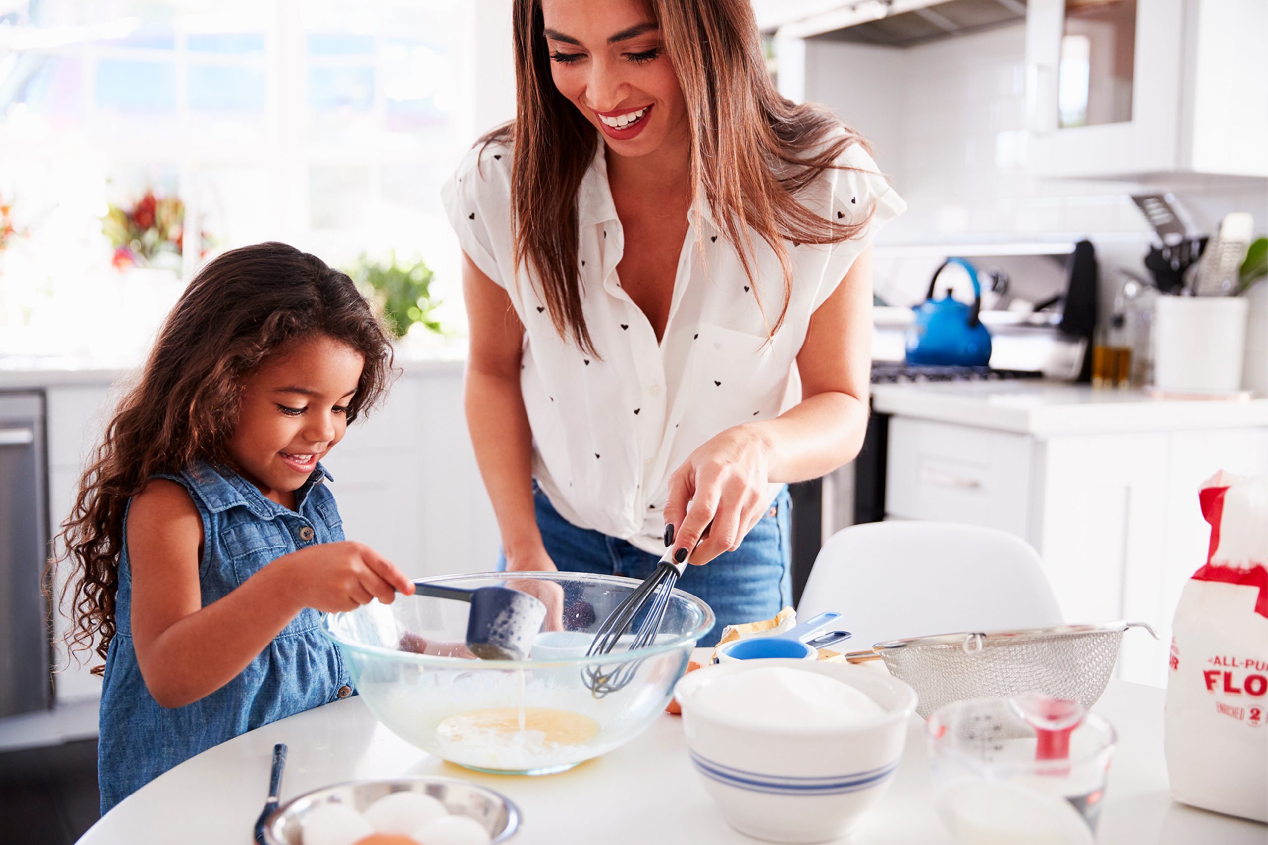 Mom and daughter baking